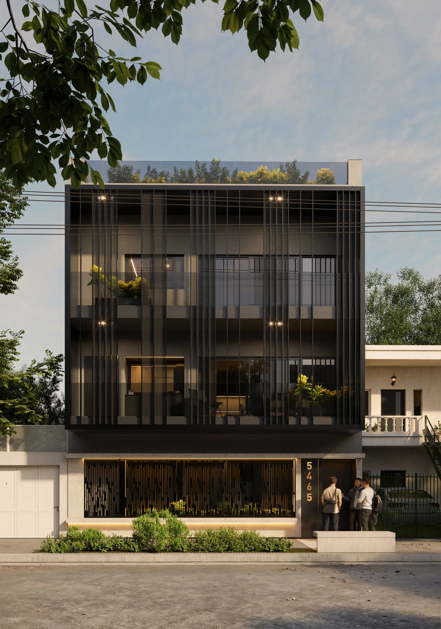 Fachada de José Luis Cantilo 5465, con su piel de parasoles metálicos negros y vegetación en los balcones